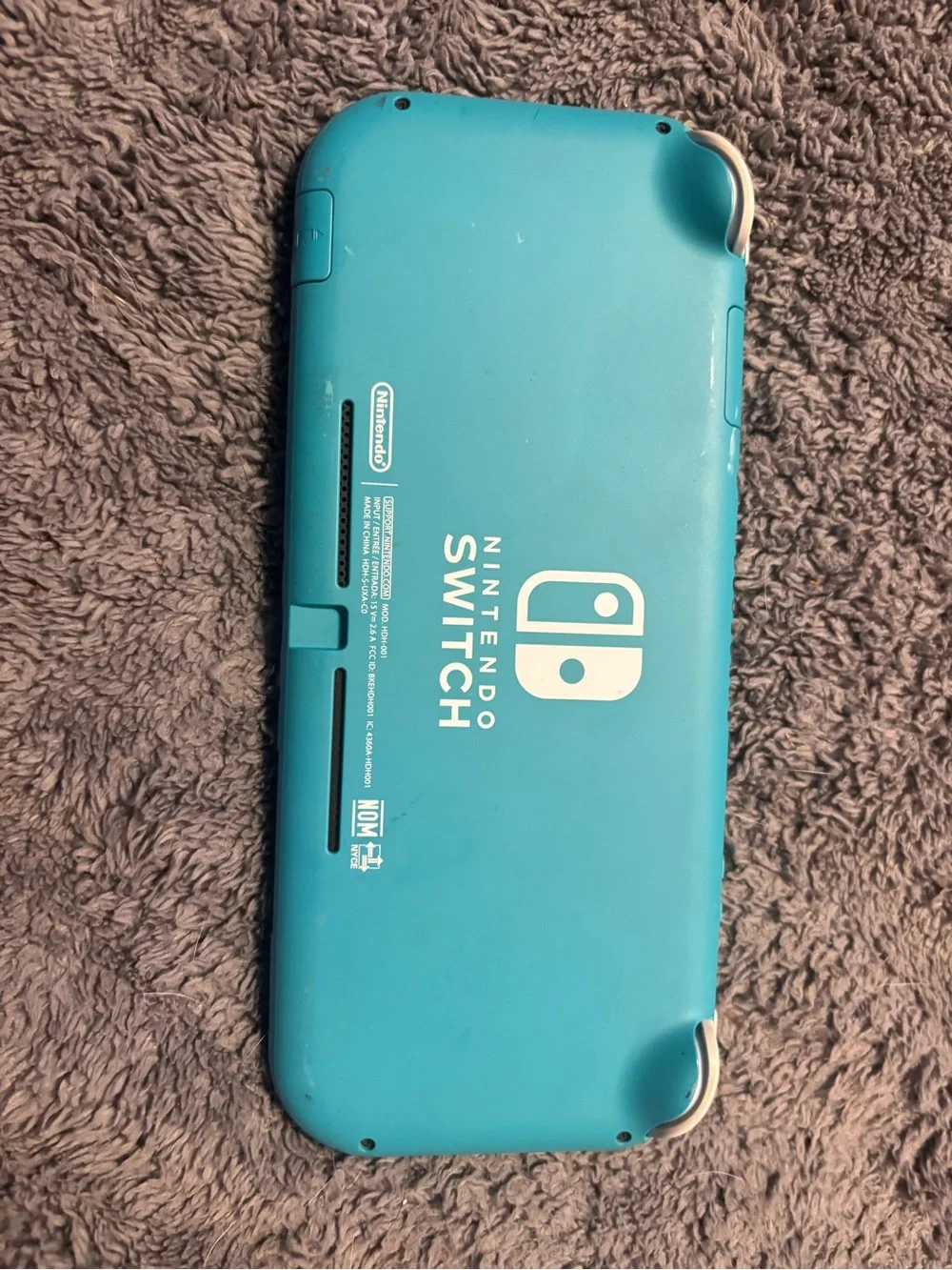 Nintendo Turquoise Handheld Gaming Console